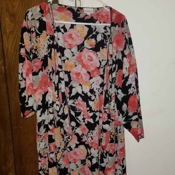 LuLaRoe Tops - Floral shirley, black background